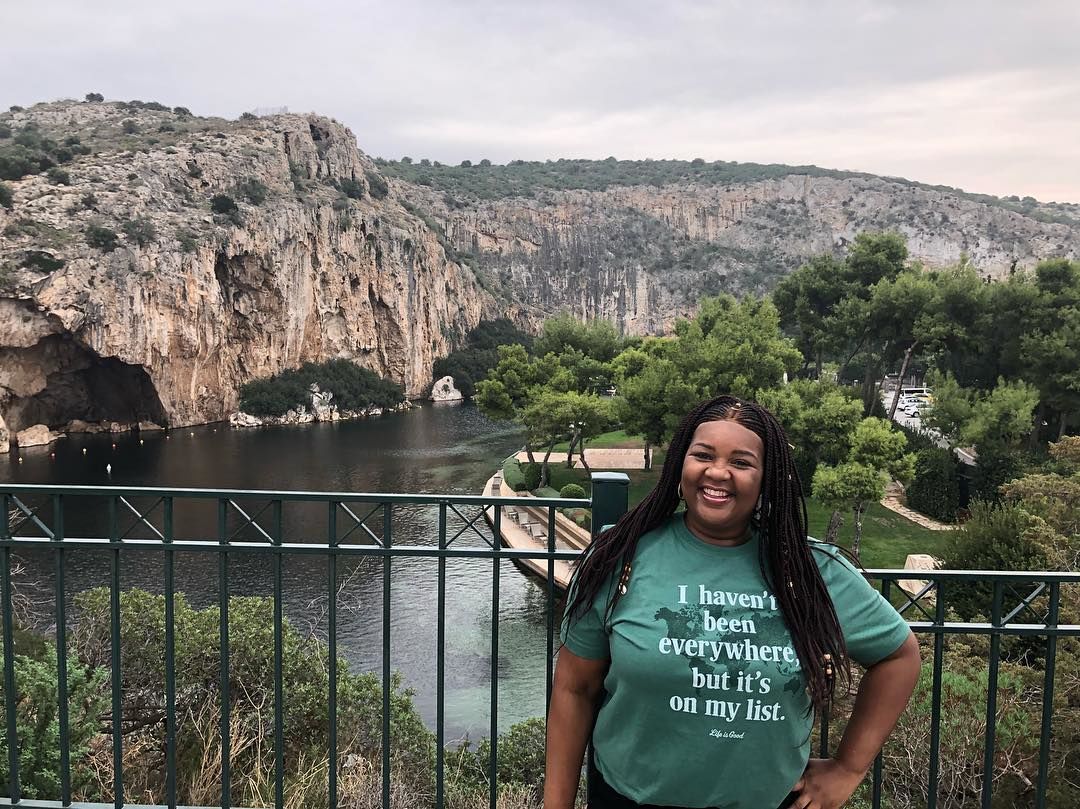 031819_im.stepster_optimismmagic_photo2 women smiling posing in front of bridge