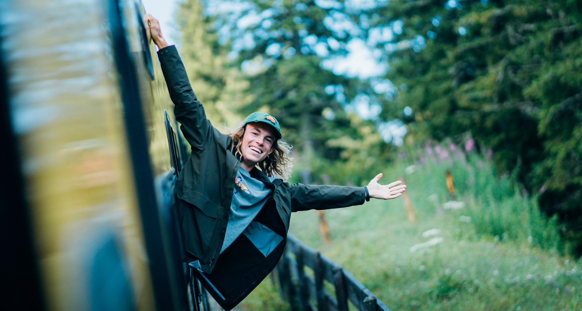 Josh hanging out a train window