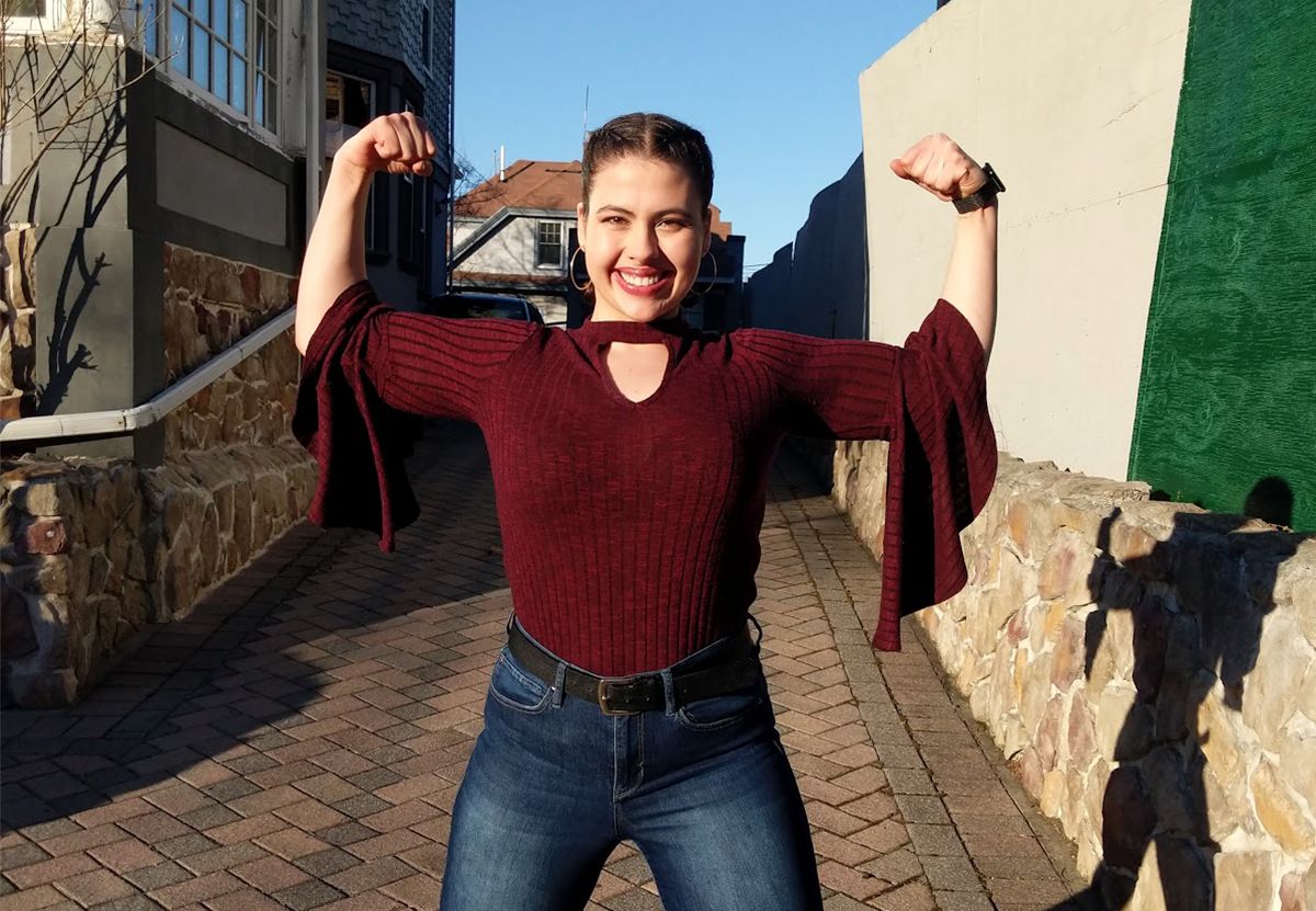 collette flexing her muscles