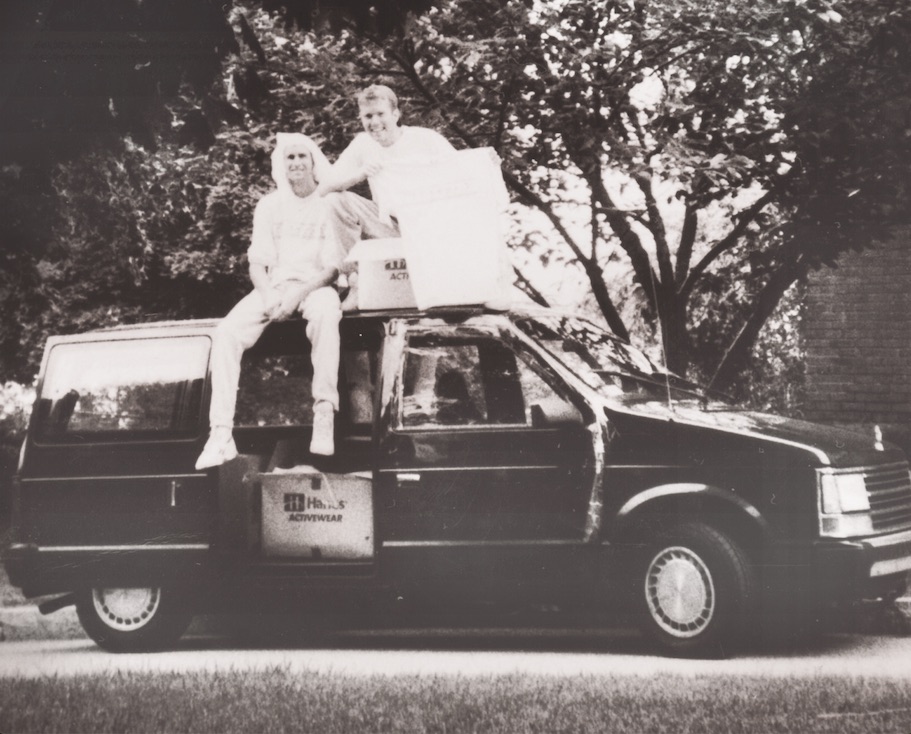 Bert and John Jacobs sitting on top of their van