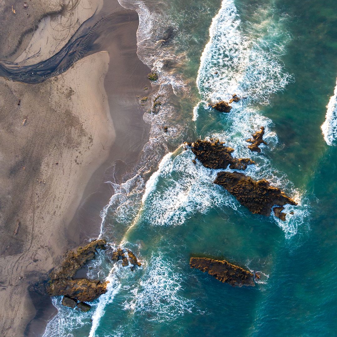 AndyAustin_2_IG Bolong Beach, Canggu from a drone: One sunrise I made the quick walk to Bolong Beach in Canggu to photograph the coast at sunrise. Even at 6am it was amazing to see how many surfers were already out catching morning waves before work.